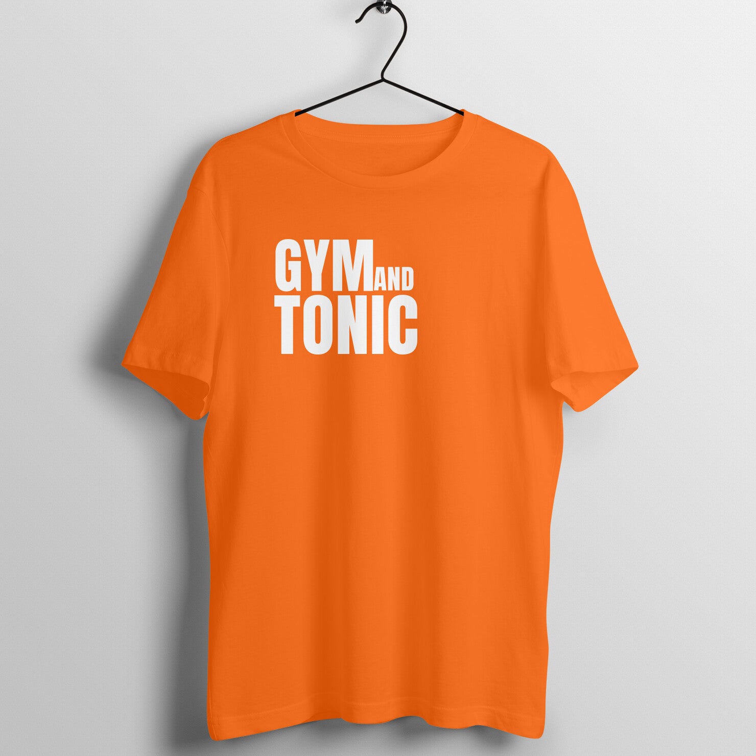 Orange women's fitness t-shirt with "Gym and Tonic" quote in white | 100% combed cotton, 180 GSM fabric | Fempowered